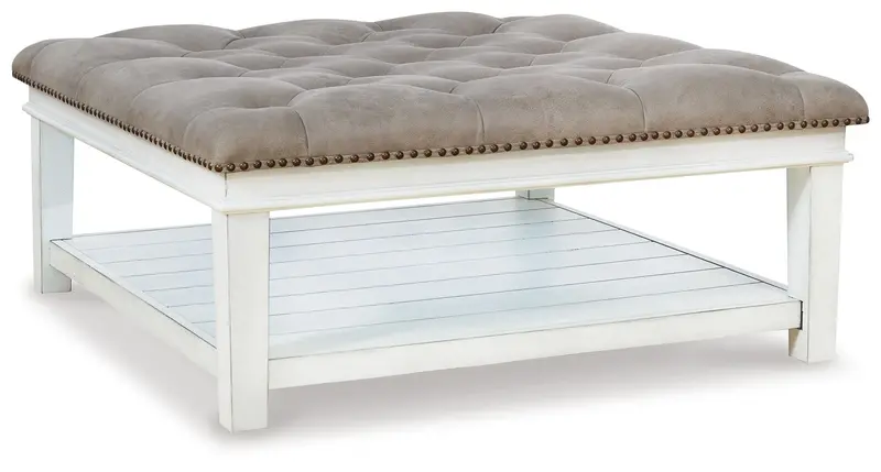 Kanwyn Upholstered Ottoman-Style Cocktail Table – Whitewash Base