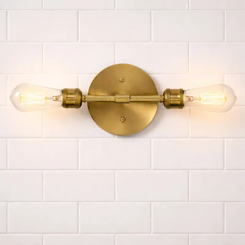 Reverie Dual-Arm Bathroom Sconce with Clear Glass Accents and Gold Finish